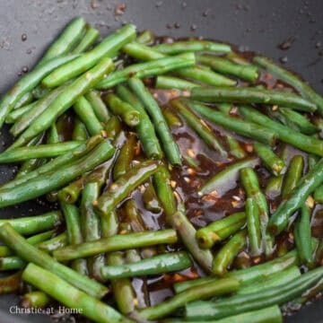 Pour in the stir-fry sauce and simmer to thicken.