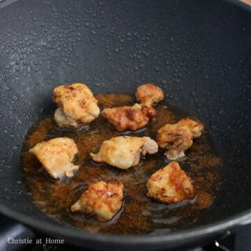 Heat vegetable oil in a large heavy bottomed pan or wok on medium heat. Fry chicken in small batches until golden brown and crispy, about 6-7 minutes in total. Flipping over halfway. (If you prefer to air fry the chicken, please see the FAQ section below).