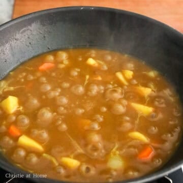 Cover and bring to a boil on high heat. Then reduce to medium heat. Cover and simmer for 15 minutes or until potatoes are fork tender and sauce is thickened. Stir occasionally scraping the bottom of the pan to fully dissolve the curry.