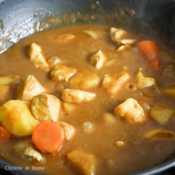 Mix in the chicken and simmer for another 1-2 minutes until meat is cooked through. Serve and enjoy hot with steamed rice.