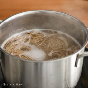 Bring a medium-sized pot filled halfway with water to boil on high heat. Add in the buckwheat noodles and cook according to package directions. (If your noodles don't come with directions, reduce to low-medium heat and cook for 2-3 minutes or until chewy).